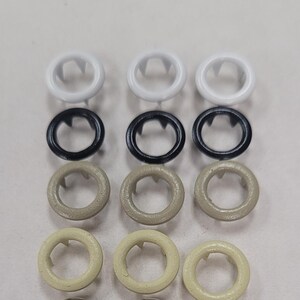 1 dozen(12 pcs)complete sets-Size 15-9mm, 5/16" diameter open ring snaps-4 parts. Made by Scovill Fasteners, Clarksville GA, USA.