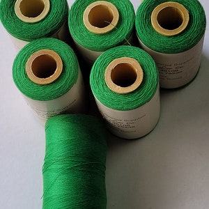 polyester covered polyester thread-kelly.  1,000 yard spool.  made in the usa.