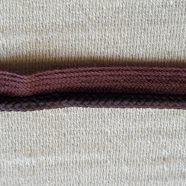Piping cord(cordege) brown, normally seen on western shirts.  1/2".  10 yards per order.