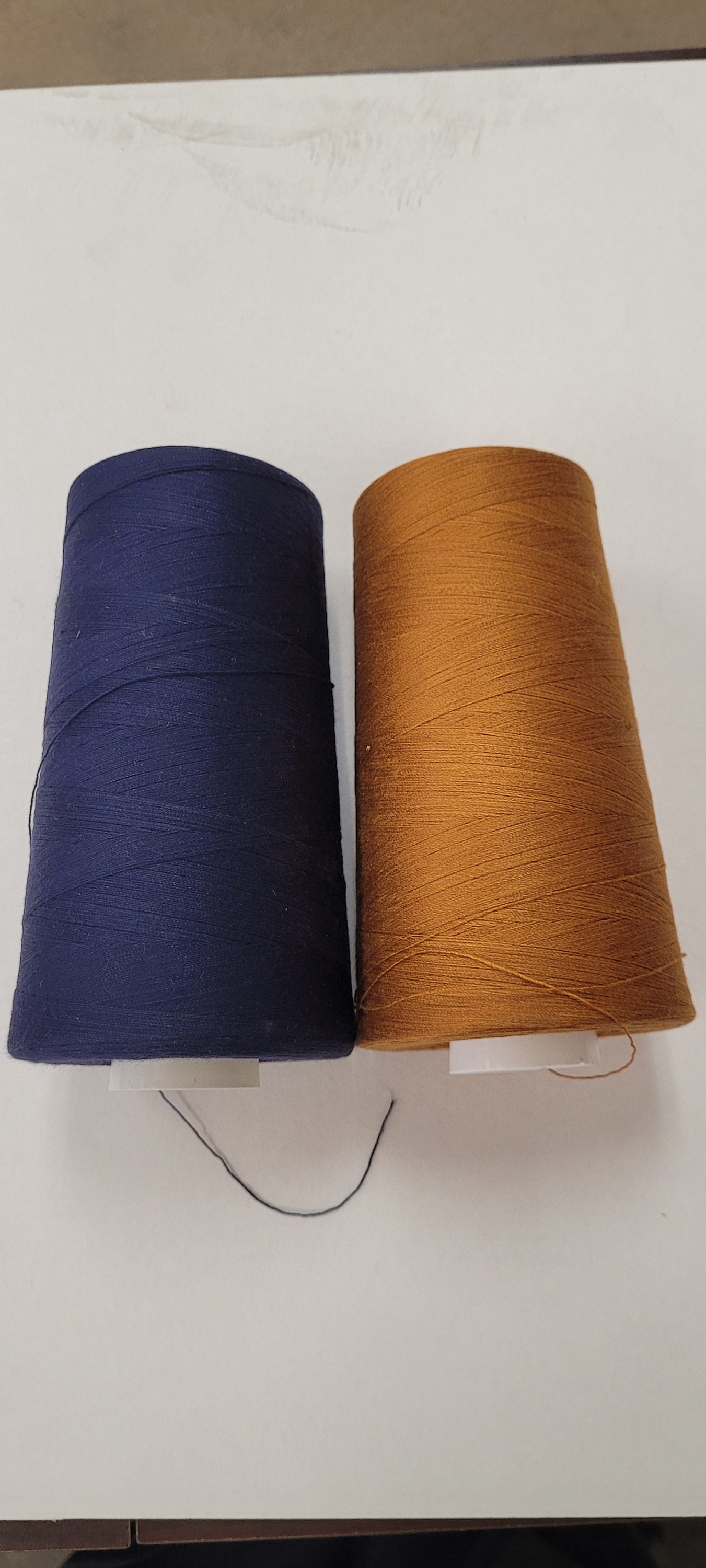 a&e (top stitching thread) d-core t-80 cotton covered polyester thread. 6000 yd cone.  made in the USA.