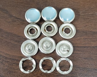Turquoise western poly pearl snaps, size 16, 3/8" diameter.  1 dozen complete sets.  made in the usa