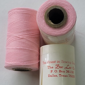polyester covered polyester thread-PINK  1,000 yard spool.  made in the usa.