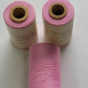 polyester covered polyester thread-ROSE  1,000 yard spool.  made in the usa.