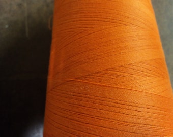 a&e excell orange T-27 spun polyester thread  tobaggon-orange.  6000 yd cone. made in the USA