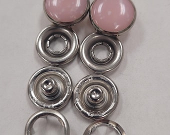 1 dozen(12 pcs)complete sets-7/16" diameter, size 18, 4 part urea western pearl snap-pink with white specs. made in usa