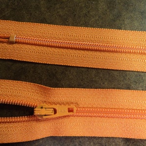 YKK® poly 12" orange zippers.  lightweight poly coil zippers.  open top, closed bottom