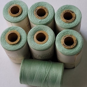 polyester covered polyester thread-Lt Green.  1,000 yard spool.  made in the usa.
