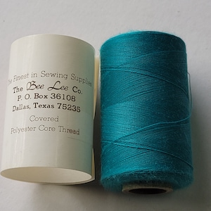 polyester covered polyester thread-teal.  1,000 yard spool.  made in the usa.