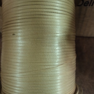 Offray 1/16" 10-yards satin ribbon, cream/tan double sided(face). made in the usa