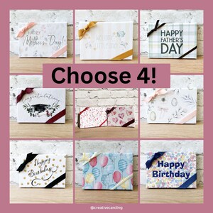 May include: Nine different gift boxes with various designs and ribbons. The boxes feature designs such as "Happy Mother's Day!" and "Happy Birthday".
