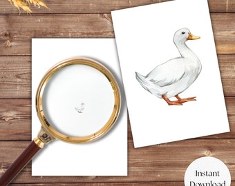 May include: A watercolour illustration of a white duck with an orange beak and feet. The duck is on a white background. A magnifying glass shows a smaller version of the duck. The words "Instant Download" are on a white circle.