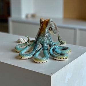 Ceramic brown and teal blue octopus handmade fits with any ocean and beach theme deco rsculpture tabletop perfect gift for any occasion