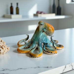 Ceramic whimsical brown and teal blue octopus handmade fits with any ocean and beach theme decor sculpture tabletop perfect for any occasion