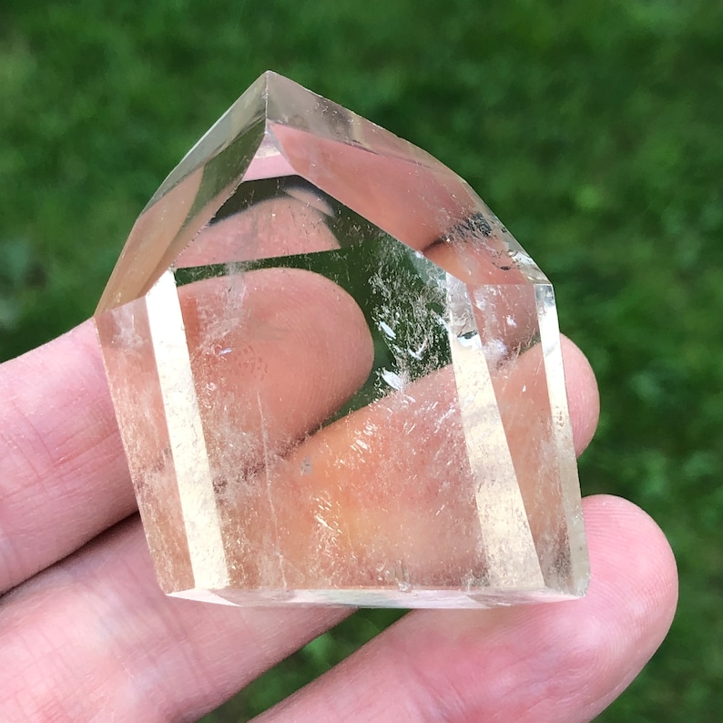 polished and facetted citrine point