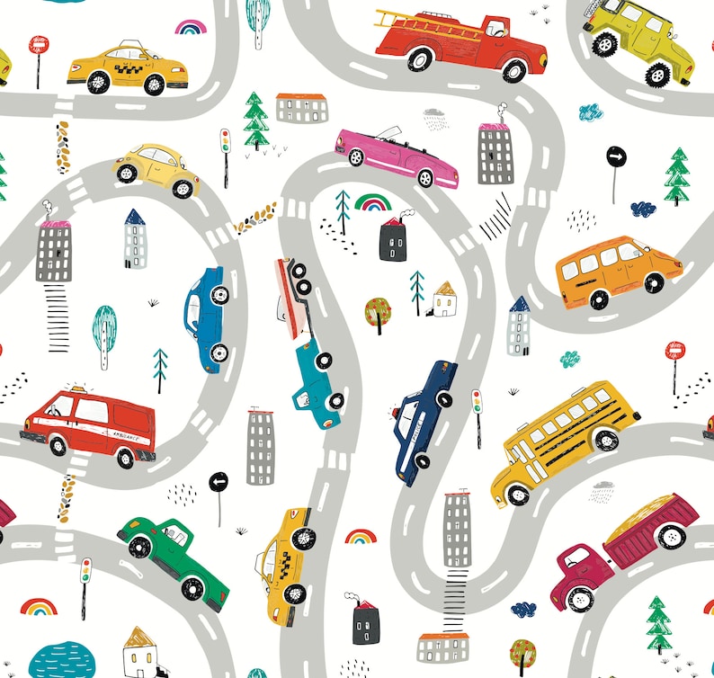 May include: A colorful illustration of a city scene with winding roads, buildings, trees, and various vehicles including a yellow school bus, a red fire truck, a police car, a taxi, a delivery truck, and an ambulance.