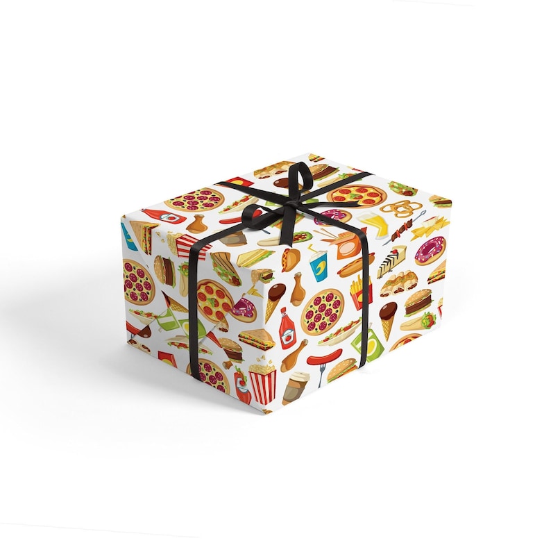 May include: A white gift box with a black ribbon and a pattern of various fast food items, including pizza, burgers, chips, and ice cream cones.