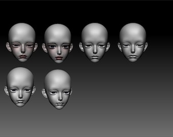 May include: Six different 3D models of a doll's head, each with a slightly different expression. The heads are all white and have realistic features.