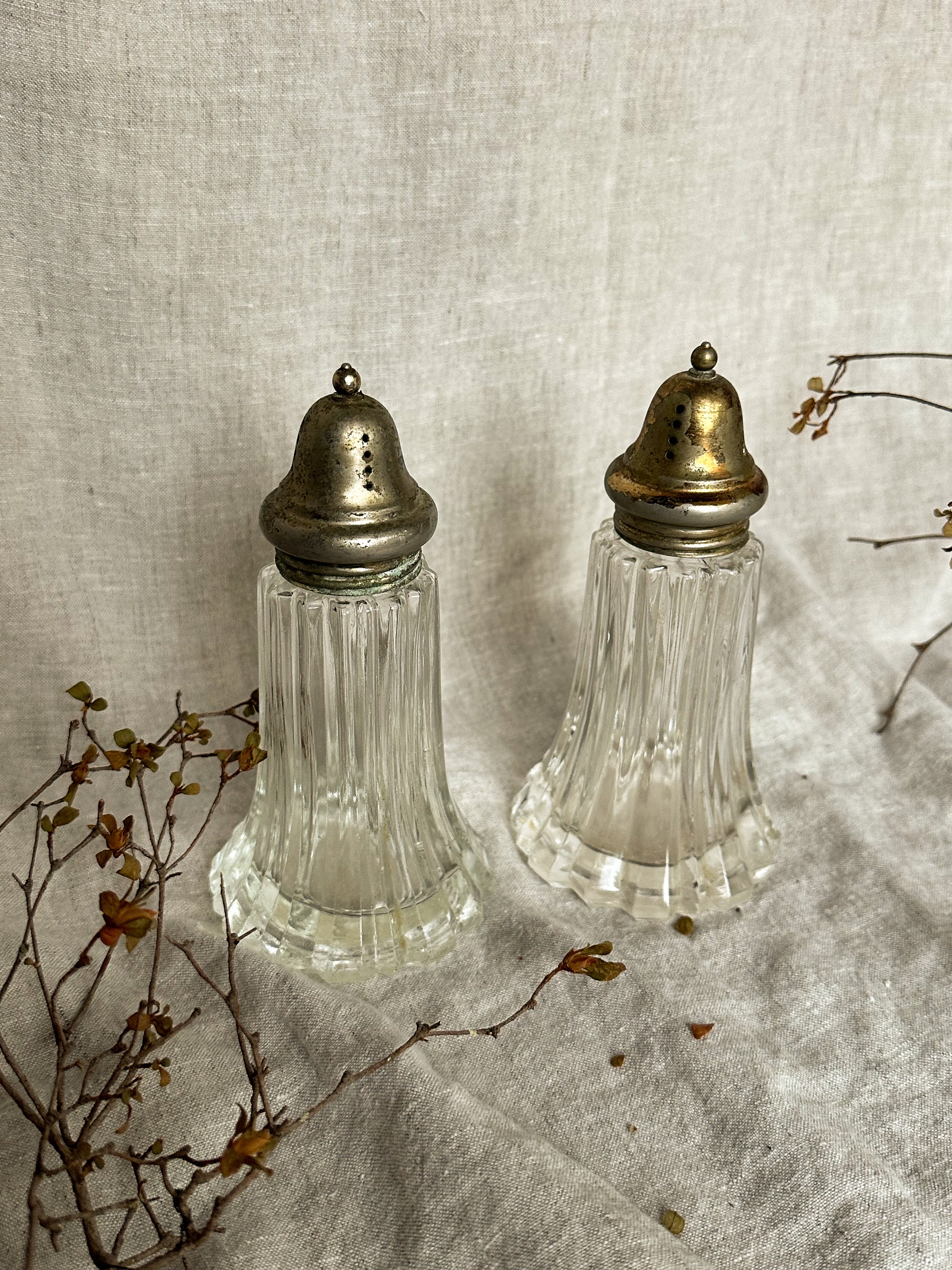Mid century, glass salt/ pepper shakers, metal top, swirl design