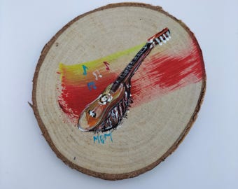 Charango painting on wood slice