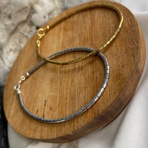 Hematite  gold and silver tube  2*2.5 mm bead bracelet