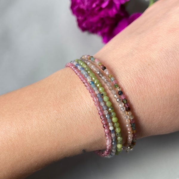 Multi gemstone 2-2.5 mm bracelets you can choose from. Garnet, trolleite, pink tourmaline, multi tourmaline, sunstone