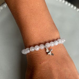 Aquamarine  faceted bead bracelet 6 mm with bird silver Pendant