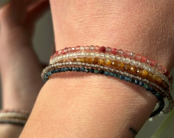 Multi gemstone 1.8-2.5 mm bracelets you can choose from. Andesine, sapphire, blue tourmaline, smoky quartz, prehnite