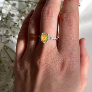 Ethiopian opal solitare ring in sterling silver