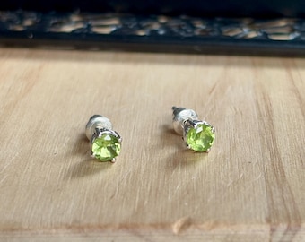 Natural faceted green peridot round stud earrings in sterling silver