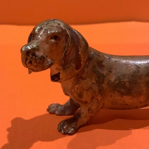 Bronze Dachshund in the style of Bergman