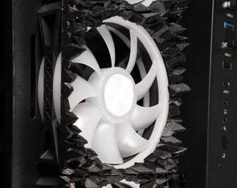 May include: Two white computer fans are mounted in a black computer case. The fans are surrounded by a black, textured material.