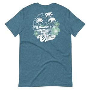 May include: A teal blue t-shirt with a white graphic of palm trees, a hammock, and the text "Ohana" with the phrase "Nobody left behind or forgotten" circling the graphic.