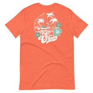 May include: Orange t-shirt with a white graphic of palm trees, a hammock, and the text "Nobody left behind or forgotten" and "Ohana".