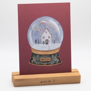 Postkarte Schneekugel