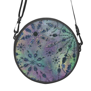 Sac cartable rond, en toile. Design frais et coloré.