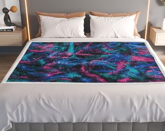 Manta cálida y suave para uso múltiple, en estampado de diseño único y colorido.