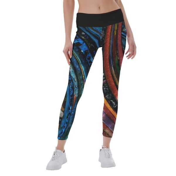 Athletic women's sport leggins in fresh and sporty design. Feel comfortable and sexy while exercising or doing yoga.