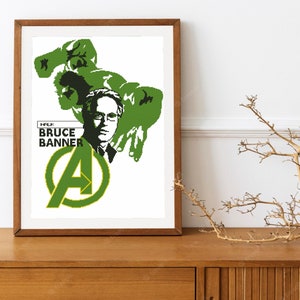 May include: A framed print of a green and black illustration of the Hulk and Bruce Banner. The text "Hulk Bruce Banner" is in a white box. The Avengers "A" logo is in the bottom center of the print.