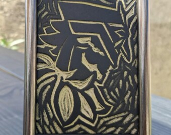 Hand-engraved and framed linoleum plaque depicting Capitano from the game Genshin Impact. Unique piece, small format 10x15cm (~4x6")