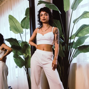 Pants with crop shop top and jacket