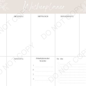 May include: A beige weekly planner with a handwritten title "Wochenplaner" in white. The planner is divided into seven days of the week: Monday, Tuesday, Wednesday, Thursday, Friday, Saturday, and Sunday. The planner also includes a section for "Prioritaten der Woche" (Priorities of the Week) and a "To Do" list.