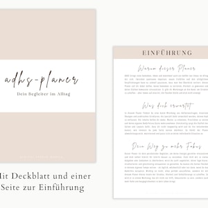 May include: A planner with a beige cover and a white band with the text "adhs-planer Dein Begleiter im Alltag" in a handwritten font. The image also shows an introduction page with text in German.