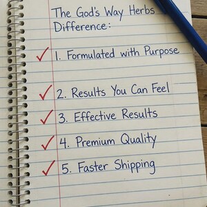 May include: A spiral-bound notebook with lined paper and a blue pen. The text reads "The God's Way Herbs Difference:" followed by a numbered list with checkmarks. The list includes "Formulated with Purpose" and "Results You Can Feel."