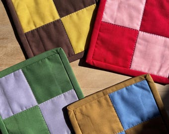 Set di 4 sottotazza a quadri di grandi dimensioni / Colori assortiti