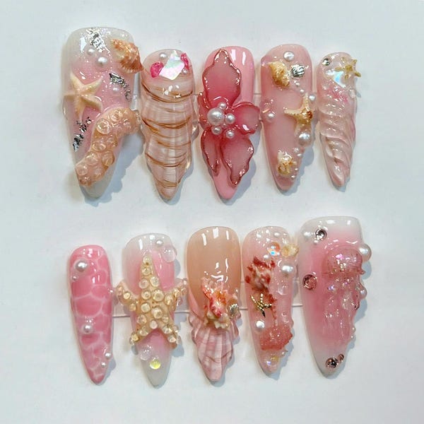 Ongles à presser roses faits main d'été, art d'ongle de floral de méduse de poulpe