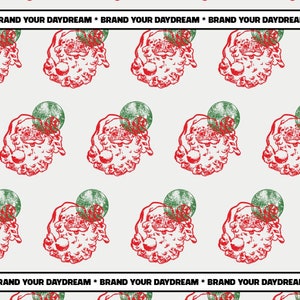 May include: A repeating pattern featuring a red Santa Claus face with a green and red ornament. The phrase "BRAND YOUR DAYDREAM" is printed in black at the top and bottom of the image. The design is on a light gray background.