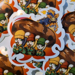 Monster Hunter Wilds Palicos Chased by a Quematrice Sticker