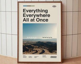 May include: A movie poster for the film "Everything Everywhere All at Once" with a desert landscape and the text "ha ha ha ha ha" repeated twice. The poster also includes the year "2022" and the names of the cast and crew.