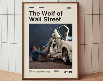 May include: A movie poster for the film "The Wolf of Wall Street" featuring Leonardo DiCaprio in a white sports car. The poster has a minimalist design with a white background and black text. The year 2013 is printed in the bottom right corner.
