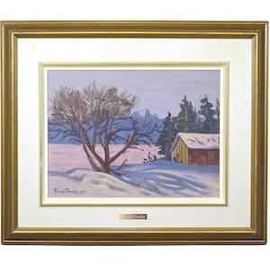 May include: An oil painting of a winter landscape, framed in gold. The artwork depicts a snow-covered scene with a leafless tree, a small building, and evergreen trees. The sky is a soft lavender color, and the snow reflects pink hues.